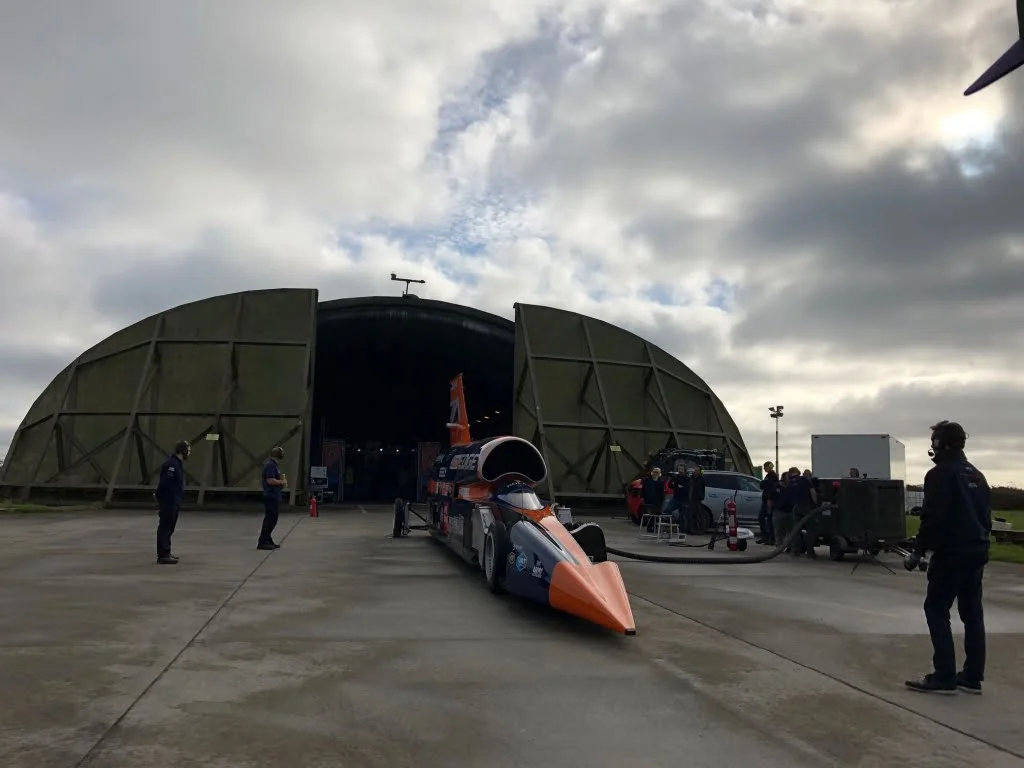 BLOODHOUND SSC being rolled out of the plane hanger 